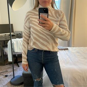 Mock neck tan zebra pattern sweater
